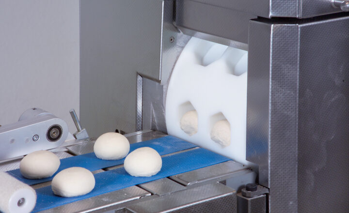 Transfer of dough pieces onto the dough sheet